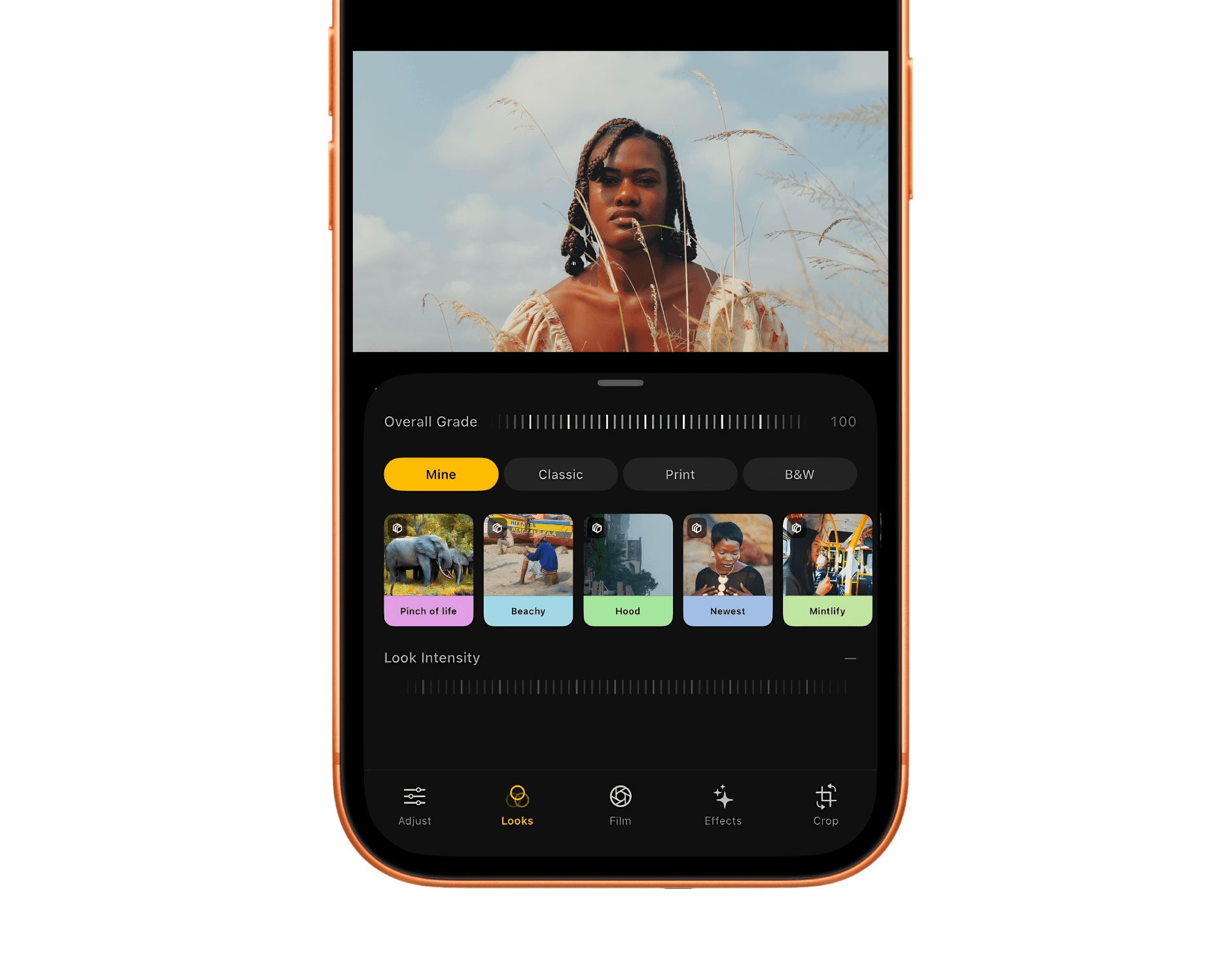 The WanColor editor on iPhone, showing film looks applied to a portrait